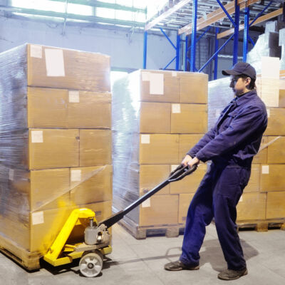 Worker,With,Fork,Pallet,Truck,Stacker,In,Warehouse,Loading,Group